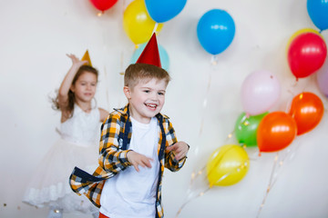 Children celebrate a birthday.