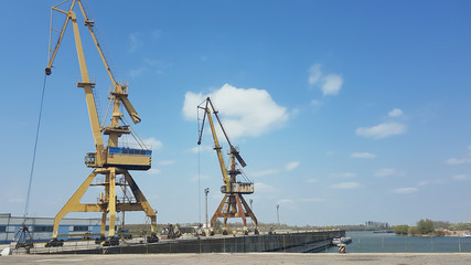Fototapeta na wymiar cranes for unloading and loading in port