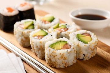 Close up on a serving of uramaki sushi