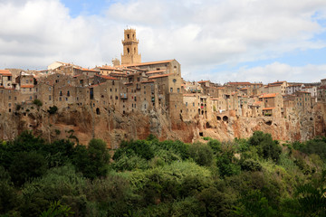 Fototapeta premium Pitigliano (GR), Italy - June 12, 2017: The historic hilltop village of Pitigliano, Grosseto, Tuscany, Italy