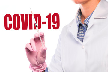 doctor holding a vaccine against the virus COVID-19 . Anti COVID-19 vaccine concept - Image