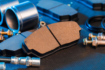 brake pads on dark background close up view