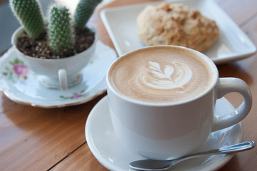 Cafe Latte on the table at bright setting, cafe time, breakfast 