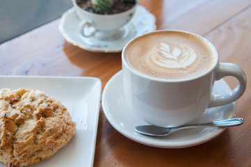Cafe Latte on the table at bright setting, cafe time, breakfast 