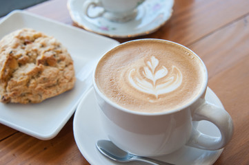 Cafe Latte on the table at bright setting, cafe time, breakfast 
