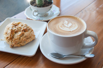 Cafe Latte on the table at bright setting, cafe time, breakfast 