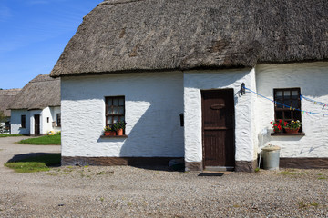 Kinvara (Ireland), - July 20, 2016: Traditional Old Irish Cottage with a thatched roof, Co. Galway, Ireland...