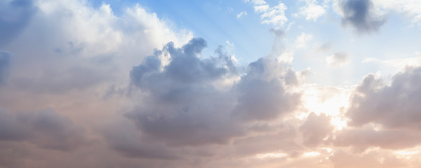 Naklejka na ściany i meble Cloudy sky panorama at sunset, natural background
