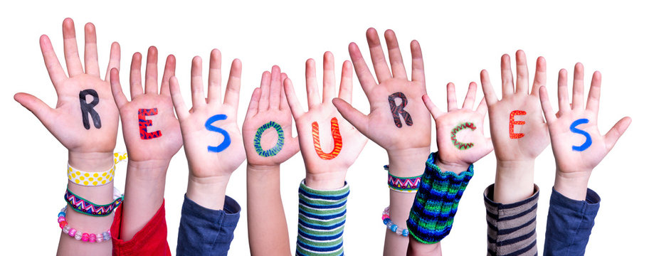 Children Hands Building Colorful Word Resources. White Isolated Background