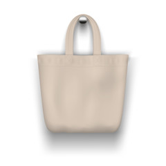 Textile beige tote bag hanging on the wall realistic vector mockup for shopping design.