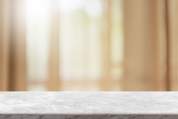 Empty white marble stone table top and blurred home interior with curtain window background with...