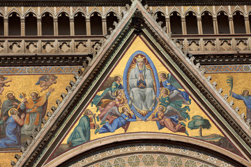 Obraz premium Orvieto (TR), Italy - May 10, 2016: A particular of Orvieto cathedral facade, Terni, Umbria, Italy