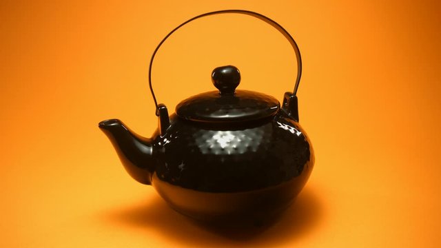 Th&eacute;i&egrave;re noire sur fond orange
