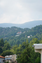Beautiful view of the mountains and houses on a sunny day
