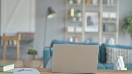 The Laptop on Desk in Creative Office