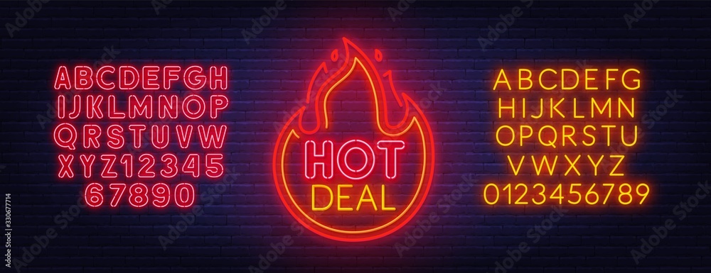 Wall mural hot deal neon sign. neon alphabet on brick wall background.