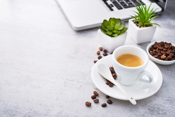 Espresso coffee with laptop