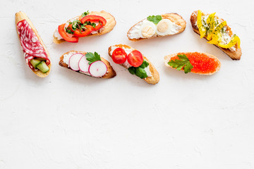 Sandwiches frame for menu design on white background top-down copy space