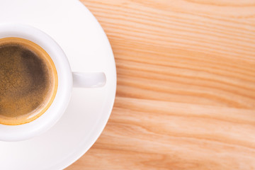 Espresso cup on a wooden table