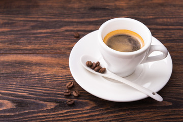 White cup with coffee