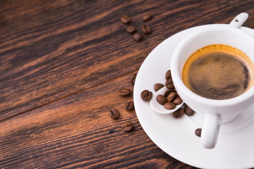 White cup with coffee