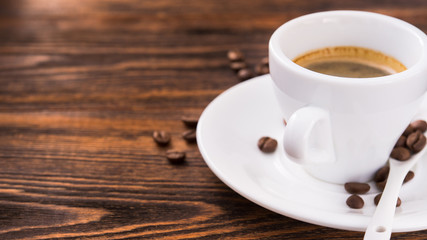 White cup with coffee