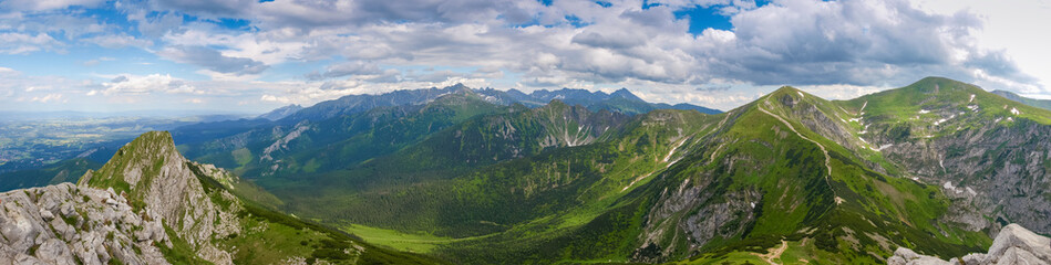 Fototapeta na wymiar Wide panorama of the Polish High Tatras from mountain Giewont