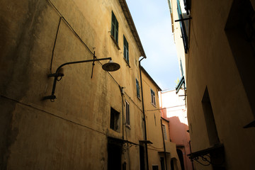 Cervo (IM), Italy - December 30, 2017: A tipycal road and houses in Cervo village, Italian Riviera,...