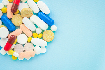pills, different types of medicine for the disease, medical preparations. background top view. copy space for text