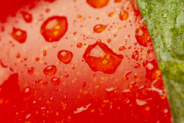 Red fresh tomato background, super macro. Texture of ripe organic vegetable.