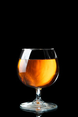 brandy or cognac on a black
