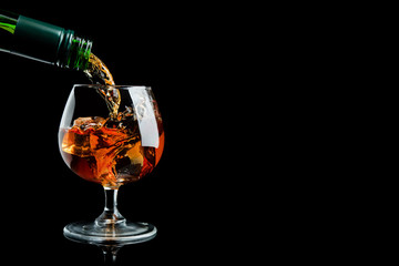 Scotch whiskey is poured into a glass