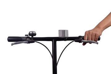 Hand holding Bicycle handlebar with a bell, brake, reflector light, isolated on white...