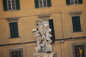 Famous Statue in front of a Building