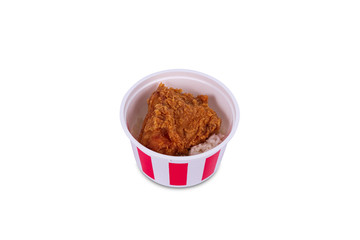 Rice with crispy fried chicken in bucket isolated on white background. Top view