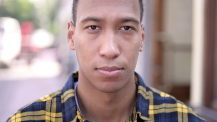 The Close up of Serious Young African Man, Outdoor