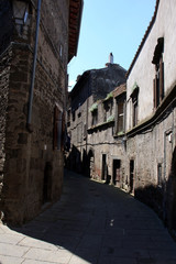 Bagnaia (VT), Italy - May 10, 2016: A typical road and houses in centre of Bagnaia village, Viterbo, Lazio, Italy