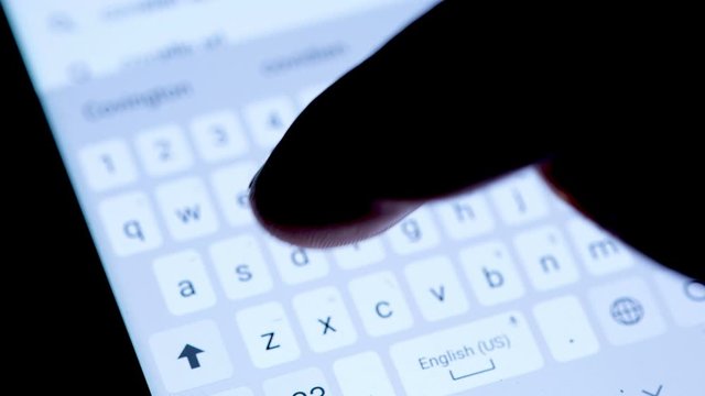 Smartphone Keyboard typing coronavirus on google search,web communication