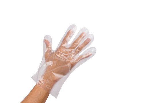 Man Hand wearing disposable plastic glove isolated on white background.Multipurpose glove.Protect hand.sanitary food contact gloves