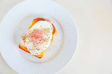 Simple egg cheese toast shot from overhead