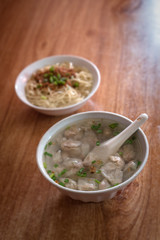 The cooking process of Chinese traditional snacks, noodles served with soy sauce and pansit