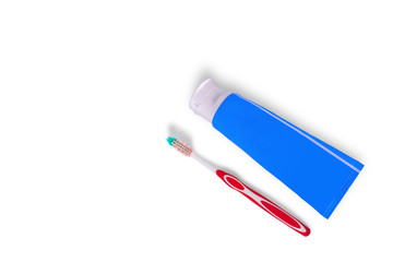 Toothbrush with toothpaste tube isolated on white background