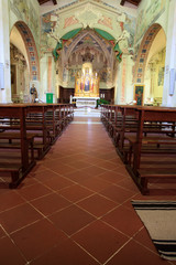 Fototapeta na wymiar Montemerano (GR), Italy - September 11, 2017: The church inside in Montemerano village, Manciano, Grosseto, Tuscany, Italy, Europe