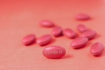 Capsule pill Medicine Positive Coronavirus or COVID-19.Medicine Of viruses in laboratory for Prevention of a pandemic in Wuhan China. scientist in biological protective Epidemic virus outbreak concept
