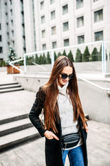 Young beautiful brunette woman with long hair