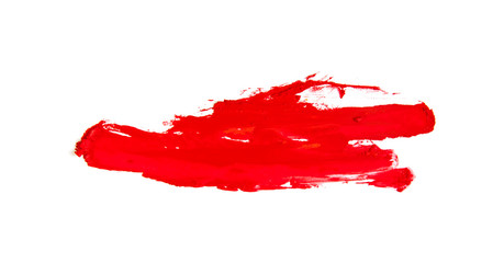 red brush stroke on a white background