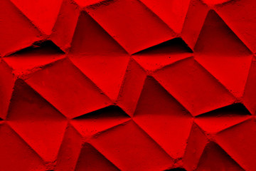 Abstract geometric red background made of concrete. Red wall with geometric patterns. 3d graphics of red geometric shapes