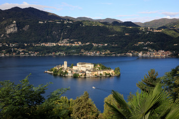 Fototapeta premium Orta San Giulio (NO), Italy - September 02, 2019: Landscape of San Giulio Island on Lake Orta, Novara, Piedmont, Italy