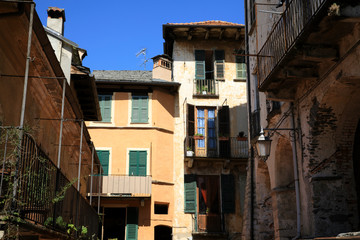 Fototapeta na wymiar Orta San Giulio (NO), Italy - September 02, 2019: Typical houses in Orta, Orta, Novara, Piedmont, Italy