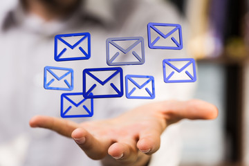 Hand with an email icon 3d